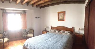 Cama o camas de una habitación en La Casilla