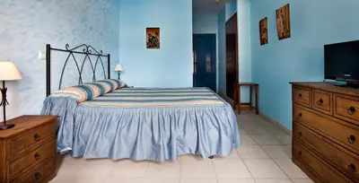 Cama o camas de una habitación en Hotel Atalaya