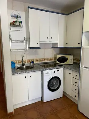 Una cocina o zona de cocina en El jardín de La Isleta