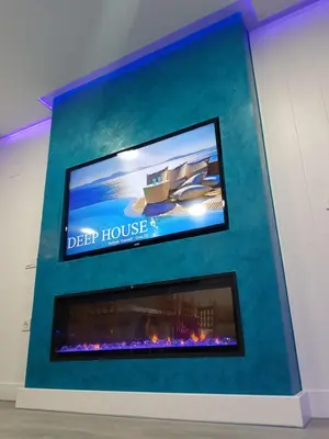 Una televisión o centro de entretenimiento en Apartamento SOLYMAR 3