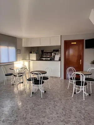 Una cocina o zona de cocina en Hostal Las Dunas