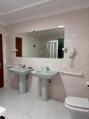Un baño de Hostal Las Dunas