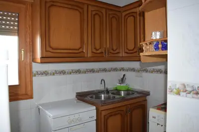 Una cocina o zona de cocina en Apartamentos Casa FERMINA - A 2 horas de las pistas de esquí
