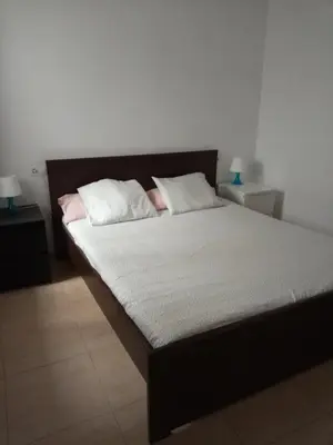 Cama o camas de una habitación en Primerísima línea de playa