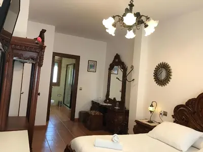 Una televisión o centro de entretenimiento en Casa Pedro