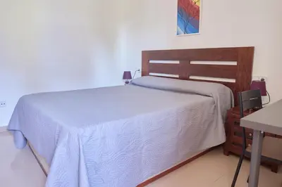 Cama o camas de una habitación en Alojamiento Particular