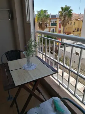 Un balcón o terraza de Apartamento ROQUETAS DE MAR MUY CERCA PLAYA