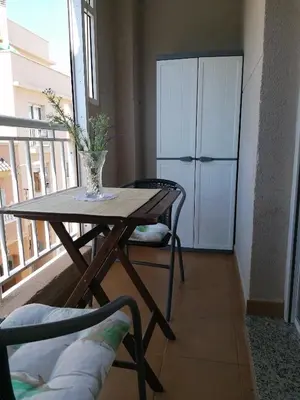Una cocina o zona de cocina en Apartamento ROQUETAS DE MAR MUY CERCA PLAYA