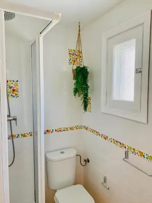 Un baño de Eonia Marinas-Dúplex con porche en primera línea!