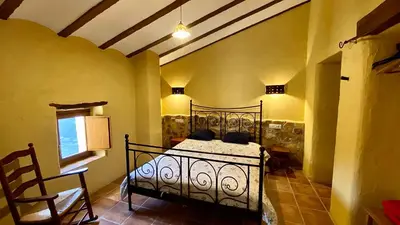 Cama o camas de una habitación en Casas Rurales Cortijo Leontino