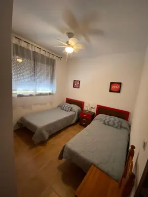 Cama o camas de una habitación en Apartamento María Isabel en Los Collados Golf - Aguilas