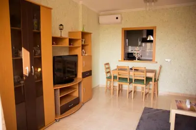 Una televisión o centro de entretenimiento en Apartamento Retamar