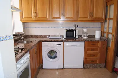 Una cocina o zona de cocina en Playa Delicias