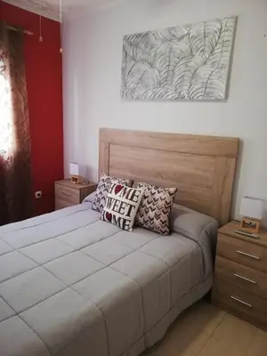 Cama o camas de una habitación en PRECIOSO ADOSADO a 100 METROS DEL MAR en VERA-PLAYA!