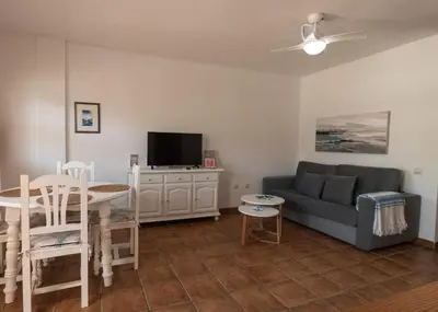Una televisión o centro de entretenimiento en Casa Indalmar San José