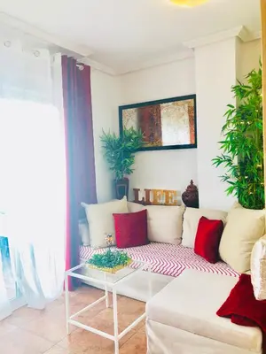 Zona de estar de ÁTICO DELUXE entre CENTRO y PLAYA Salinas con TERRAZA, WIFI, PISCINA climatizada, GYM, SAUNA y GARAJE -Smart TV