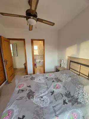 Cama o camas de una habitación en El Faro Puerto Rey