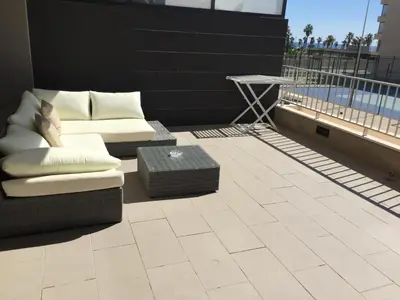 Un balcón o terraza de Apartamento Lujo, Primera linea playa, Garaje, Wifi, Piscina climatizada