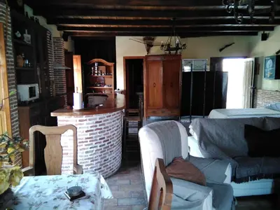 Zona de estar de Estudio Rustico
