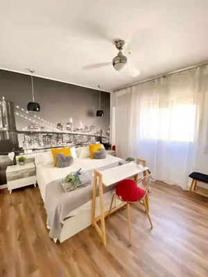 Cama o camas de una habitación en Céntrico ,Moderno y confortable Apartament