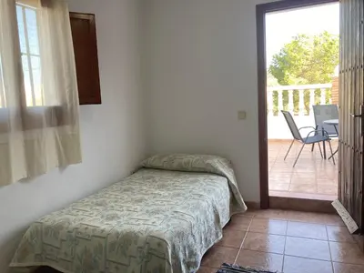 Cama o camas de una habitación en Cortijo Los Garridos - 12 huéspedes
