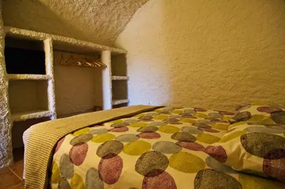 Cama o camas de una habitación en Cueva Pura Vida