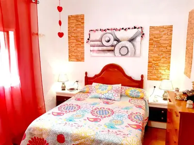 Cama o camas de una habitación en Charming House in Íllar with Mountain View and Balcony