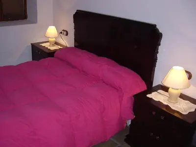 Cama o camas de una habitación en Cuevas Rio Baza
