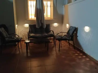 Zona de estar de Apartamento Naturista con jardín Torremar Natura Junto a la playa