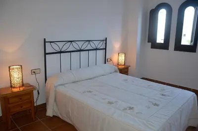 Cama o camas de una habitación en APARTAMENTO EL CAPRICHO DE AGUAMARGA