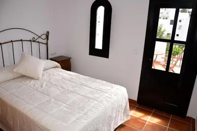 Cama o camas de una habitación en APARTAMENTO EL CAPRICHO DE AGUAMARGA