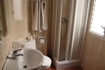 Un baño de Pension Americano