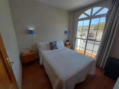 Cama o camas de una habitación en Hostal Costa Rica