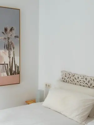 Cama o camas de una habitación en CalaLuna Mojácar - Precioso ático en Macenas Resort, con vistas panorámicas a mar y montaña