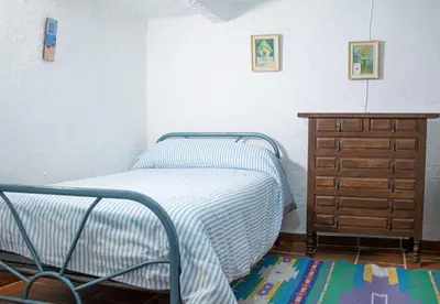 Cama o camas de una habitación en Cueva Navarro