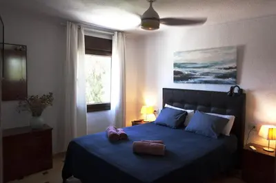 Cama o camas de una habitación en Casa Indalina apartamento con parking privado incluido