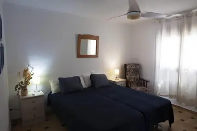 Cama o camas de una habitación en Casa Indalina apartamento con parking privado incluido