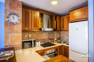 Una cocina o zona de cocina en Apartamento EL CABO V