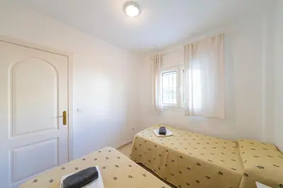 Cama o camas de una habitación en Apartamento Balcón de San José, piscina, parking