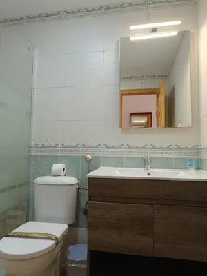 Un baño de Bahía de Vera Estudio