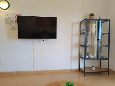 Una televisión o centro de entretenimiento en Bahía de Vera Estudio