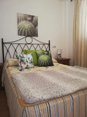 Cama o camas de una habitación en APARTAMENTO NATURISTA en PRIMERA LÍNEA DE VERA PLAYA!!!