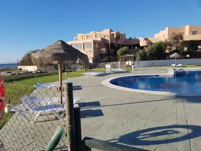 Piscina en o cerca de APARTAMENTO NATURISTA en PRIMERA LÍNEA DE VERA PLAYA!!!