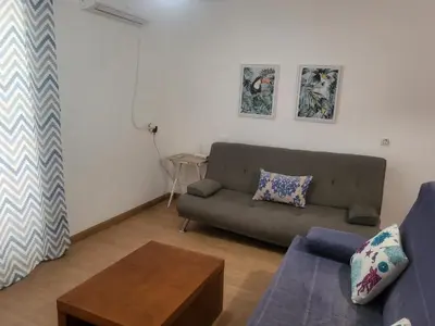 Zona de estar de APARTAMENTO NATURISTA en PRIMERA LÍNEA DE VERA PLAYA!!!
