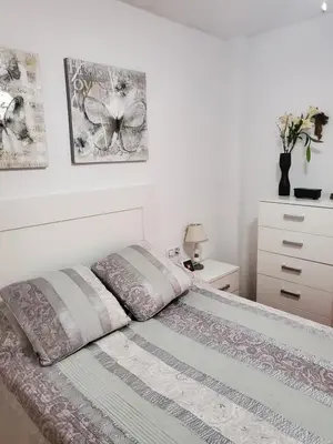 Cama o camas de una habitación en CASA BAJA EXTRAORDINARIA EN URBANIZACIÓN NATURISTA!