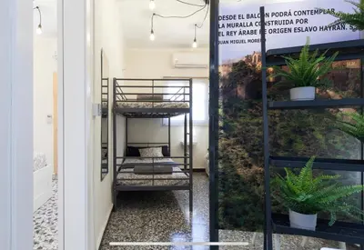 Cama o camas de una habitación en Boutike Wellness Centro Almería