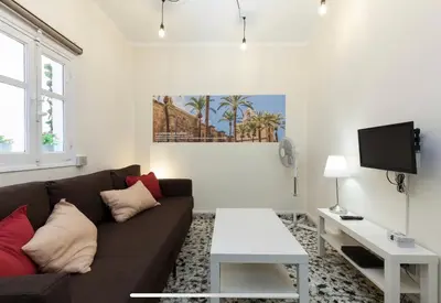 Una televisión o centro de entretenimiento en Boutike Wellness Centro Almería