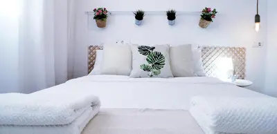 Cama o camas de una habitación en ROQUETAS BEACH HOUSE Apartamento fresco con Piscina