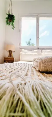 Cama o camas de una habitación en BEACH HOUSE AGUILAS - Excelente Ubicacion!! Centro con Vistas Playa Delicias con Aire
