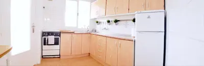 Una cocina o zona de cocina en BEACH HOUSE AGUILAS - Excelente Ubicacion!! Centro con Vistas Playa Delicias con Aire